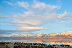 Mountain view featuring a residential view and a water view