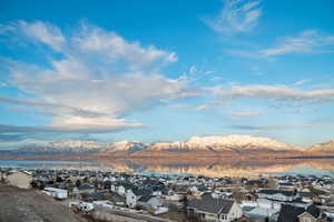 Mountain view with a residential view and a water view