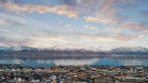 Water view featuring a residential view and a mountain view