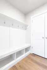 Mudroom featuring wood finished floors