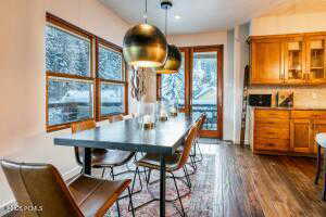 Dining space featuring dark hardwood / wood-style flooring