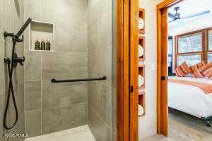 Bathroom featuring tiled shower