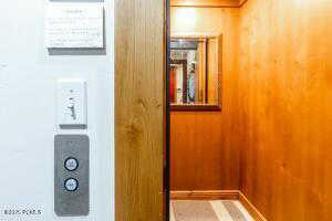 Room details featuring wooden walls