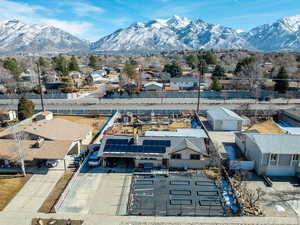 Aerial view featuring a residential view and a mountain view