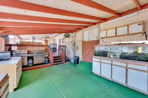 Interior space featuring beamed ceiling