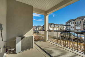 Balcony featuring a residential view