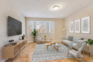 Living area featuring baseboards