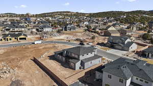 Drone / aerial view with a mountain view and a residential view