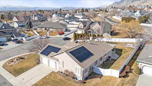 Aerial view featuring a residential view and a mountain view