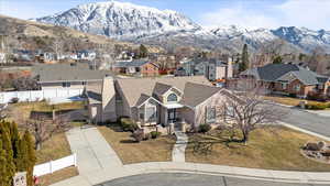 Drone / aerial view with a residential view and a mountain view