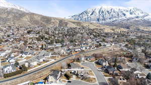 Drone / aerial view with a residential view and a mountain view