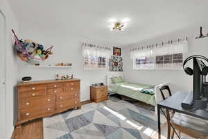 Bedroom featuring light wood-style floors