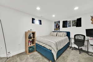 Bedroom featuring carpet floors, recessed lighting, and baseboards