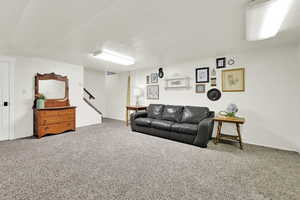 Living room featuring carpet