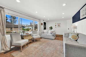 Living room featuring recessed lighting and wood finished floors