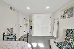 Bedroom featuring baseboards, a closet, visible vents, and recessed lighting