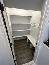 Mudroom with wood finished floors