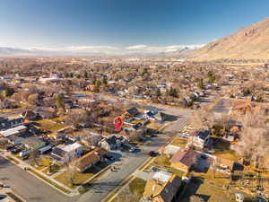 Drone / aerial view featuring a residential view and a mountain view