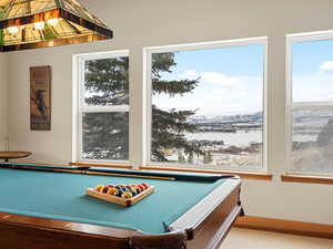 Playroom featuring baseboards, a mountain view, and pool table