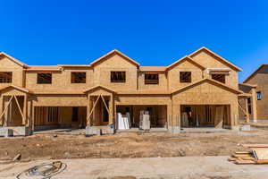 Property in mid-construction with a patio area