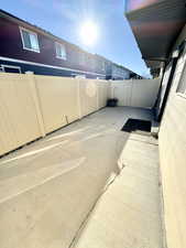 View of patio featuring a fenced backyard