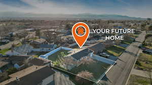 Birds eye view of property featuring a residential view and a mountain view