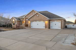 View of front of property featuring a garage