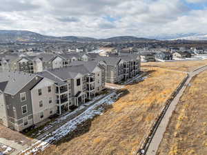 Drone / aerial view with a mountain view and a residential view