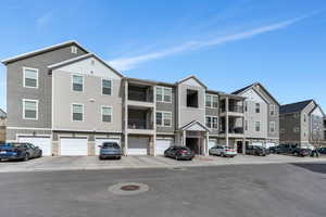 View of front of property with a garage