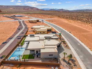 Birds eye view of property featuring a mountain view