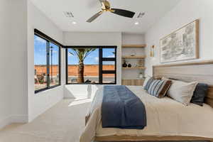 Bedroom featuring light carpet, baseboards, visible vents, and recessed lighting