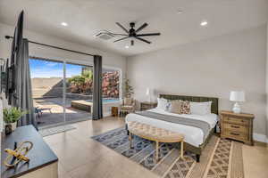 Tiled bedroom with access to outside, visible vents, baseboards, and recessed lighting