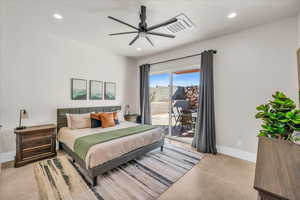 Bedroom with access to exterior, baseboards, visible vents, and recessed lighting