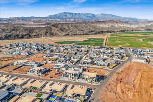 Drone / aerial view featuring a residential view and a mountain view