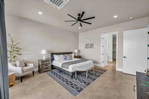 Bedroom with baseboards, visible vents, ceiling fan, and recessed lighting