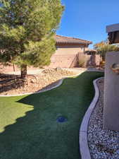 View of yard with a fenced backyard