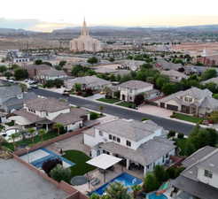 Aerial view of residential area with a mountainous background