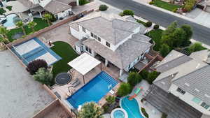Aerial view of residential area with a pool