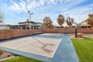 View of basketball court with community basketball court and fence