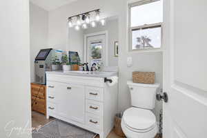 Bathroom with vanity and toilet