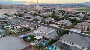 Aerial view at dusk of a residential view and a mountain view