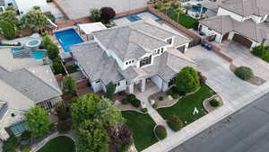 Aerial view of residential area featuring a pool area