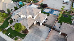 View of subject property with a pool area