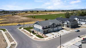 Drone / aerial view with a mountain view and a rural view