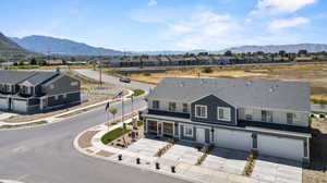 Aerial view featuring a residential view and a mountain view