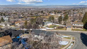 Drone / aerial view with a residential view and a mountain view