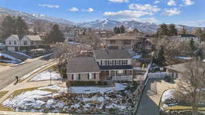 Aerial view featuring a mountain view and a residential view