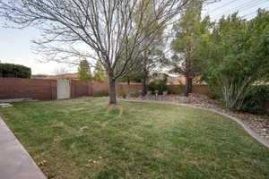 View of yard featuring a fenced backyard