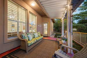 Exterior space featuring an outdoor hangout area