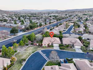 Aerial view featuring a mountain view and a residential view